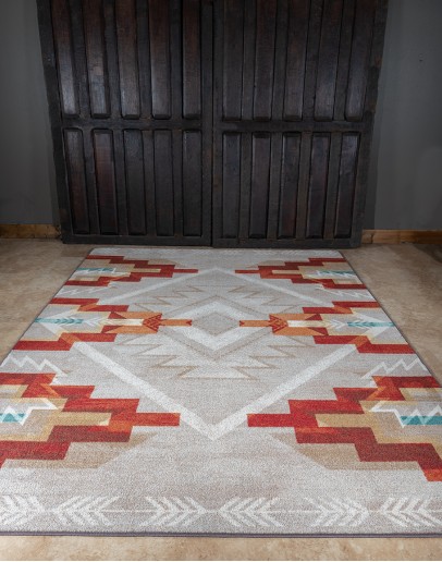 Bourbon Creek Bronze Rug Shop the exquisite Bourbon Creek Bronze Rug - 100% American-made with endurastan nylon. Commercial-rated, stain and odor resistant. Southwest-inspired design in taupe with accents of rust, teal, burnt orange, and cream. Elevate your space with this durabl