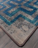 southwestern style rug with light blues and greys