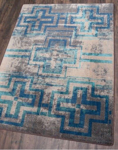 Distressed Bounty Glacier Rug southwestern style rug with light blues and greys