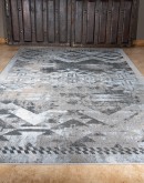 distressed southwestern style rug with neutral color tones