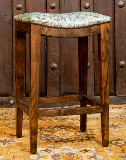 saddle stool with light turquoise leather seat cushion