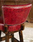 red leather armless leather swivel barstool
