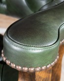dark olive green leather bar stool with axis deer hair on back