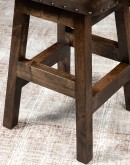 brown leather barstool with boot stitch design on back