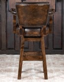 brown leather barstool with boot stitch design on back