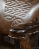 brown leather barstool with boot stitch design on back