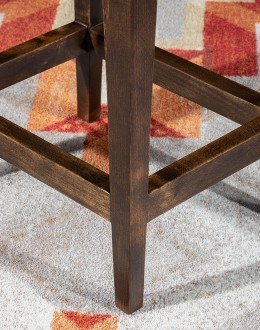 An image showcasing the Levi Saddle Stool, a masterpiece of American craftsmanship. The stool features a denim blue aniline dyed full grain leather seat, lightly sanded for a distressed look. Its clean-lined design boasts solid Alder Wood straight legs, r