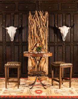 saddle stool with leather seat cushion