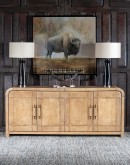 Sonora Sand Buffet featuring soft curved corners, wrapped in thick palomino saddle leather with leather-wrapped handles, offering a luxurious and elegant look
