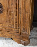 brown carved wood buffet with hand carvings