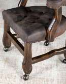 game chair with axis deer hide and brown tufted leather seat cushions