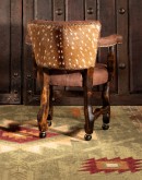 game chair with axis deer hide and brown tufted leather seat cushions