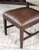 High End Dining Chair with a solid hardwood frame, top grain leather seat cushion, and tweed textured fabric on the backrest, adorned with brass nail tacks.