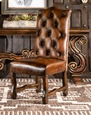 leather dining chair with a button tufted seat back and real axis deer hide