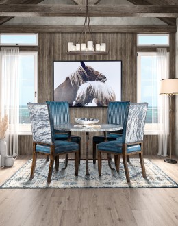 American-made Huckleberry Leather Dining Chair in blue top grain leather with hand-antiqued details, modern rustic frame, and unique hair-on-hide floral pattern on the back.