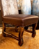 fine dining chair with a white embossed croc pattern leather
