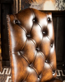 fine leather dining chair with a button tufted seat back and croc leather on back,chaps leather and croc back dining chair