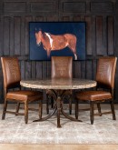 Sundance Saddle Leather Dining Chair featuring solid American Alder Wood frame with black walnut finish, saddle tan leather upholstery, brass nail tacks, and boot stitch emblem.