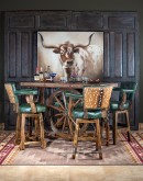 Western-style Pioneer Wagon Wheel Pub Table featuring a solid hand-forged iron base with a detailed wagon wheel design, finished in natural rust and sealed for durability. The top is crafted from distressed Chilean Pine, adding rustic elegance to the piec