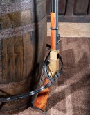 Experience the fusion of American heritage and old Western charm with the Rifleman Barrel Pub Table. Crafted from an authentic whiskey barrel and adorned with .22 caliber replica rifles, this saloon-style table seats four and adds a unique, rustic eleganc