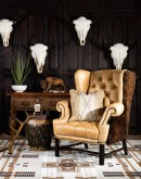 large wingback chair with buffalo hair on back