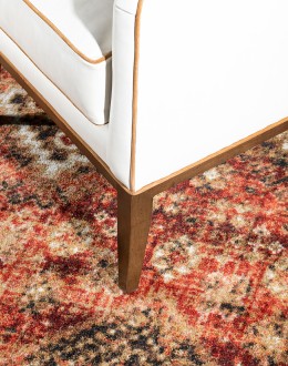 cream leather accent chair with exposed wood frame and contrasting welts