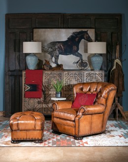 American-made Author Tufted Leather Chair by Remington Tanners, featuring full-grain leather, 8-way hand-tied construction, and deep button tufts, perfect for elegant interiors.