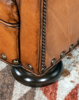 American-made Author Tufted Leather Chair by Remington Tanners, featuring full-grain leather, 8-way hand-tied construction, and deep button tufts, perfect for elegant interiors.