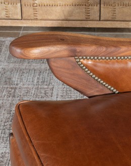 modern rustic leather chair with exposed wood arms