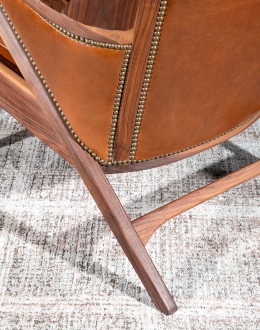 modern rustic leather chair with exposed wood arms