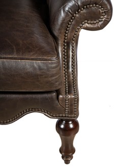 Fine Western Style Wing Back Chair with a Boot Stitch Design leather chair with western boot stitching design