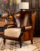 oversized leather wingback chair with a shearling hide seat cushion,saddle leather chair