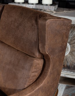 Bronco Blaze Leather Chair Bronco Blaze Leather Chair in distressed chocolate brown, showcasing arched wings, bustle back design, and American-made craftsmanship.