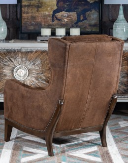 Bronco Blaze Leather Chair Bronco Blaze Leather Chair in distressed chocolate brown, showcasing arched wings, bustle back design, and American-made craftsmanship.