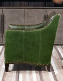 distressed olive color leather chair with boot stitch emblem on seat back