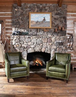 distressed olive color leather chair with boot stitch emblem on seat back