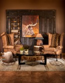 distressed tan leather wingback chair with genuine axis deer skin