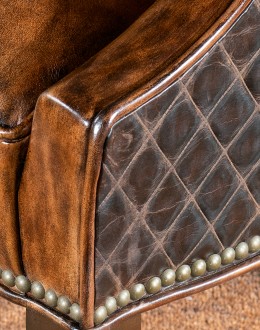 Diamondback Leather Chair in modern rustic style, featuring full-grain, hand-burnished leather and diamond-stitched top-grain leather accents, made with 8-way hand-tied construction, perfect for bedroom, office, or living area.