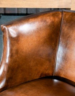 Diamondback Leather Chair in modern rustic style, featuring full-grain, hand-burnished leather and diamond-stitched top-grain leather accents, made with 8-way hand-tied construction, perfect for bedroom, office, or living area.