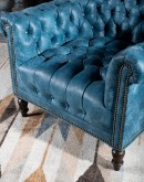 distressed denim leather chair with button tufting