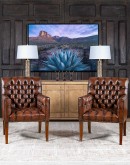 Elegant Tufted Leather Chair with deep button tufting, brass nail accents, and hand-burnished full-grain leather.