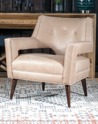 Rhodes Leather Chair in cream top grain leather with a low-profile, modern rustic design, showcasing American craftsmanship.