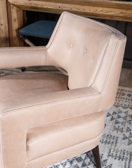 Rhodes Leather Chair in cream top grain leather with a low-profile, modern rustic design, showcasing American craftsmanship.