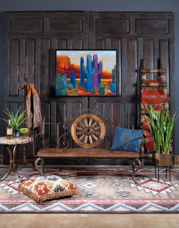 Rustic Pioneer Wagon Wheel Bench made of hand-forged iron and wire-wheeled Chilean Pine, comfortably seating three people, with a distinctive wagon wheel design integrated into the middle