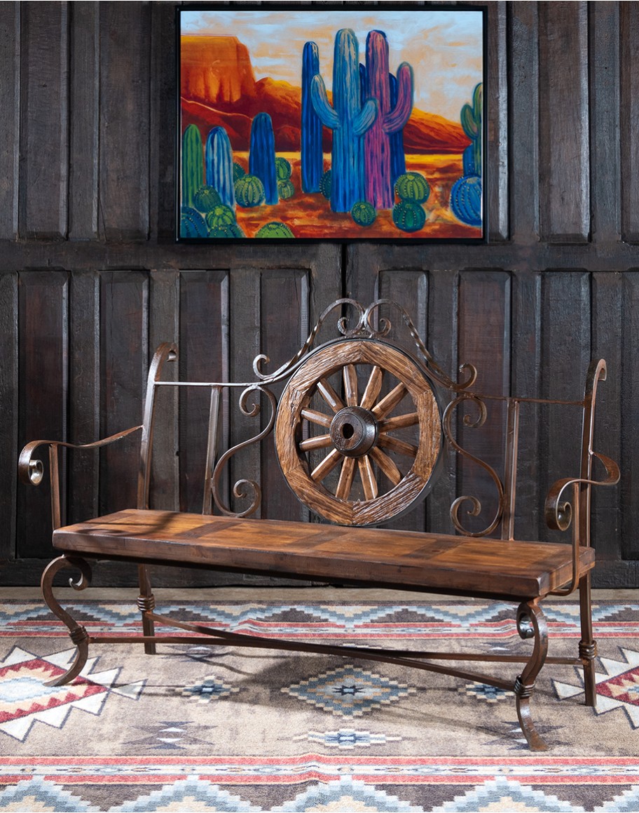 Rustic Pioneer Wagon Wheel Bench made of hand-forged iron and wire-wheeled Chilean Pine, comfortably seating three people, with a distinctive wagon wheel design integrated into the middle