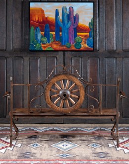 Rustic Pioneer Wagon Wheel Bench made of hand-forged iron and wire-wheeled Chilean Pine, comfortably seating three people, with a distinctive wagon wheel design integrated into the middle
