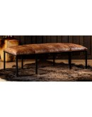 rectangular ottoman with a leather top and iron base