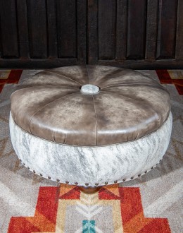 36 inch round ottoman with grey leather top and grey brindle cowhide on the base
