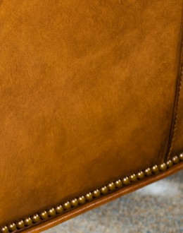 modern rustic tan leather recliner with button tufted back and arms