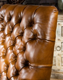 modern rustic tan leather recliner with button tufted back and arms